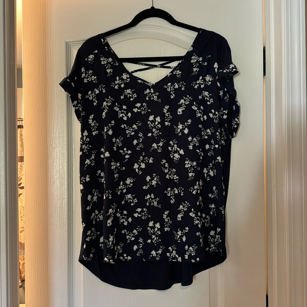 Blue short sleeved flowered blouse with Kris Kross back